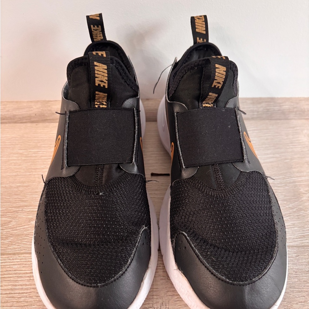 Nike Black and Gold Athletic Shoes